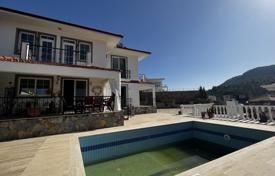 Villa in Uzumlu among mountains and forests, 20 km from Fethiye, with heating, pool, 4 balconies, fireplace, barbecue, parking, surveillance for $366,000
