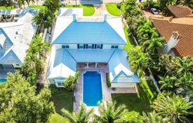 Elegant villa with a plot, a pool, a garage and a terrace, Miami, USA for $5,950,000