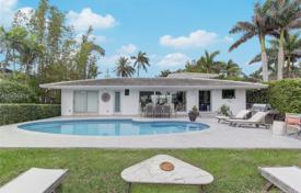 Two-storey villa with a swimming pool, a dock, a terrace and a view of the bay, Miami, USA for $2,177,000
