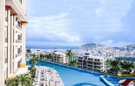 Apartments with a panoramic view in a new gated residence with swimming pools, an aquapark and a cinema, Alanya, Turkey for $211,000