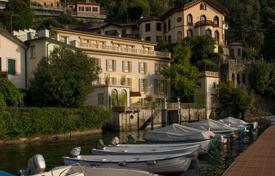 Three-level villa with a private jetty on the first line in Torno, on Lake Como, Italy for 21,000 € per week