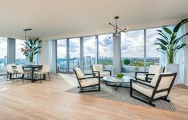 Penthouse with an elevator, a roof-top terrace with a pool and panoramic views in a full-service residence with a private beach, Miami Beach for $10,900,000