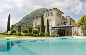Classic four-level villa overlooking Lake Como and the mountains in Argegno, Lombardy, Italy for 19,800 € per week