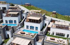 5+1 – 4+1 detached villas with private pool and a perfect sea view and in a special complex with private beach for $3,042,000
