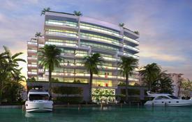 Comfortable apartments with a view of the canal and the marina in a condominium with a pool and a gym, Bay Harbor Islands, USA. Price on request