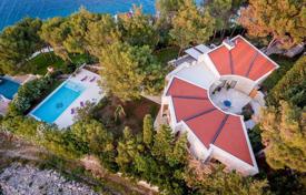 Luxury villa with a swimming pool, a garden and a panoramic view at 30 meters from the sea, Brac, Croatia for 3,350,000 €