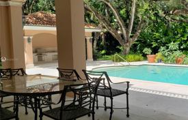 Comfortable villa with a backyard, a swimming pool, a summer kitchen, a sitting area, a terrace and a parking, Coral Gables, USA for $3,975,000