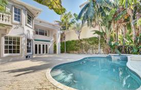 Magnificent two-story villa with a pool, a spa, a garage, a terrace and views of the bay, Sunny Isles Beach, USA for $2,375,000