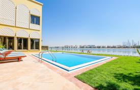 Elite villa with a terrace, a pool, sea views and a private beach, near the golf course, Palm Jumeirah, Dubai, UAE. Price on request