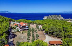 Three-storey villa with a swimming pool, a sports ground and a large garden near the sea in Loutraki, Peloponnese, Greece for 580,000 €