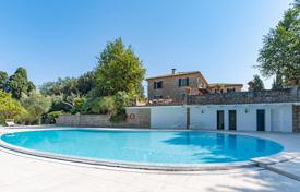 Classic villa with a pool, a guest house, an olive grove and a huge plot in Pesaro, Marche, Italy. Price on request