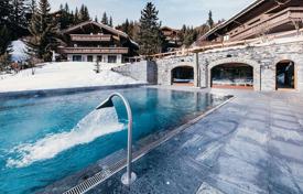Two-storey chalet with a swimming pool, a fitness center and a cinema, Crans Montana, Switzerland for 75,000 € per week