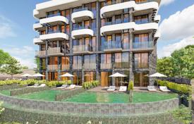 Duplex apartments with a panoramic sea view in a new residence with a garden, a pool and a spa area, 800 meters from the beach, Kargicak for $201,000