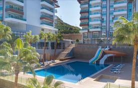 Furnished one-bedroom apartment in a residence with swimming pools and a tennis court, 400 meters from the sea, Kargıcak, Turkey for $156,000