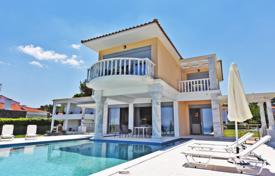 New furnished villa with a swimming pool and a garden at 20 meters from the sea, Kassandra, Greece for 3,300,000 €