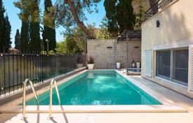 Modern four-level villa with a pool, a garage and a sea view in Split, Croatia. Price on request