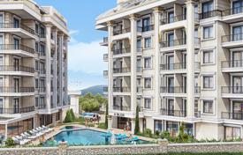 Penthouse with a balcony and a terrace in a new residence with a swimming pool, a cinema and a kids' club, Oba, Turkey for $237,000