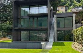 Modern villa with a swimming pool and a pier on the shores of Lake Como in Laglio, Italy for 15,000,000 €