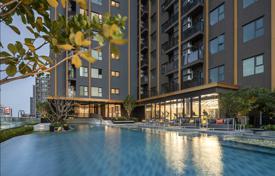 High-rise residence with a swimming pool and lounge areas in a posh neighborhood of Bangkok, Thailand for From $135,000