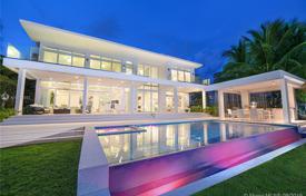 Modern villa with a backyard, a pool, a summer kitchen, a sitting area, a terrace and two garages, Miami Beach, USA for $7,500,000