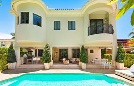 Spacious villa with a garden, a backyard, a swimming pool, a summer kitchen, a sitting area, a terrace and a garage, Miami Beach, USA for $2,749,000
