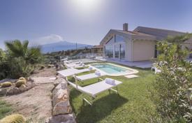 New villa with a panoramic view, a swimming pool and a jacuzzi near the beach, Taormina, Italy for 4,500 € per week