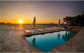 Cozy villa with a patio, a pool, a spa, a garage, a terrace and an ocean view, Miami Beach, USA for $5,499,000