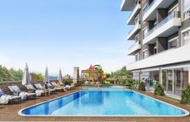 Modern apartments in a new residence with swimming pools and a kids' playground, Oba, Turkey. Price on request