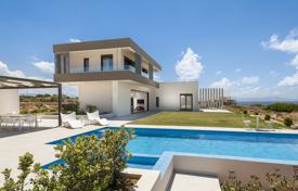 Modern three-storey villa with a pool and a tennis court in Stavros, Crete, Greece for 1,500,000 €