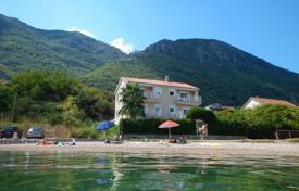 Three-storey villa with separate apartments on the seafront in Prcanj, Kotor, Montenegro for 1,250,000 €