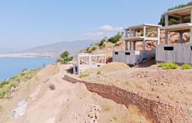 Three unfinished houses with a large plot and sea views in Kalamata, Peloponnese, Greece for 710,000 €