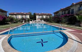 Apartment in Fethiye, 500 m from Calis beach, with terrace, balconies, in a complex with swimming pool, bar, video surveillance, games room for $211,000