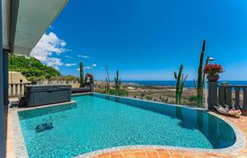 Three-level furnished villa with a pool and ocean views in Adeje, Tenerife, Spain for 3,690,000 €