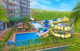 Residence with swimming pools, an aquapark and a spa center at 80 meters from the sea, Mersin, Turkey for From 94,000 €