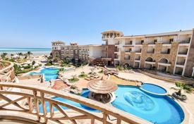 Sea and pool view 2 bedroom apartment for sale in a beachfront resort for 125,000 €