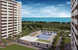 New residence with an aquapark, swimming pools and a tennis court at 150 meters from the beach, Mersin, Turkey for From $102,000