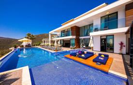 Modern villa with a garden, a swimming pool and a picturesque view close to the sea, Kalkan, Turkey for 9,900 € per week